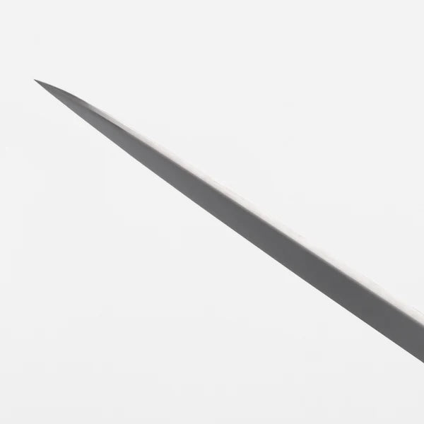 Close-up of amber jigged bone knife handle