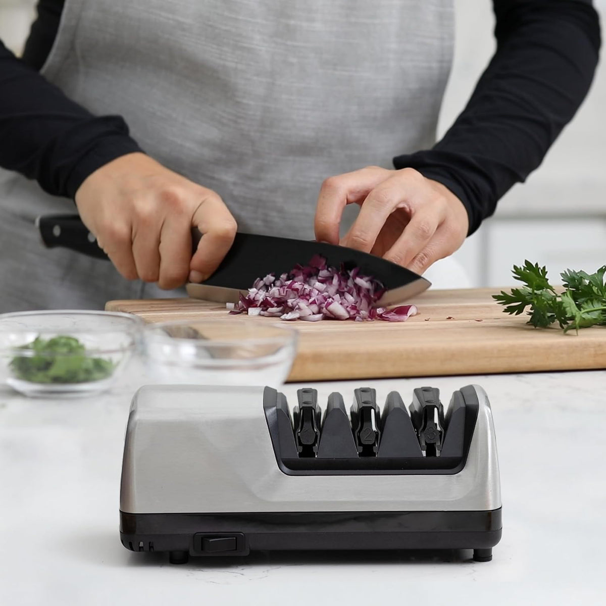Automatic knife sharpener with precision angle guides