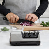 Automatic knife sharpener with precision angle guides