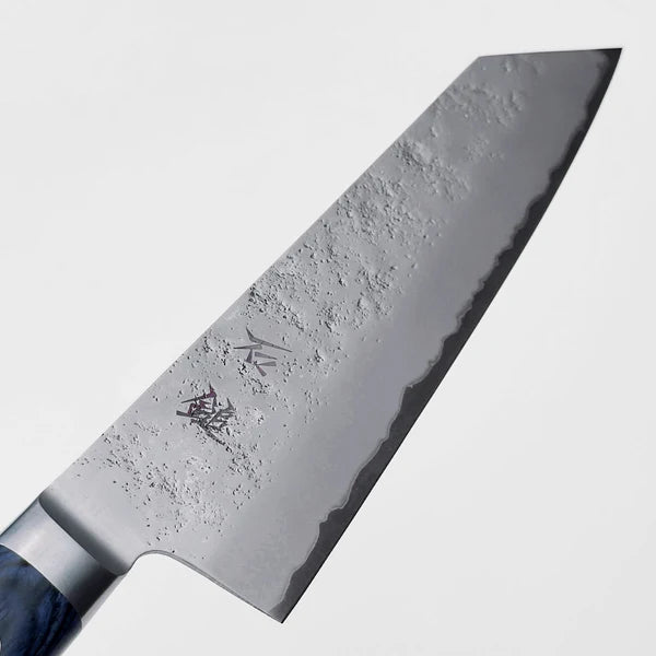 Close-up of Kiritsuke Gyuto razor sharp blade edge