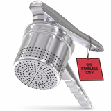 Stainless steel potato ricer pressing cooked potatoes to prepare smooth homemade mashed potatoes.
