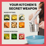 Stainless steel potato ricer with manual pressing design for preparing smooth mashed potatoes.