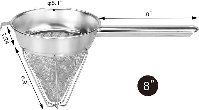 Fine mesh conical kitchen strainer filtering sauce for smooth food preparation.